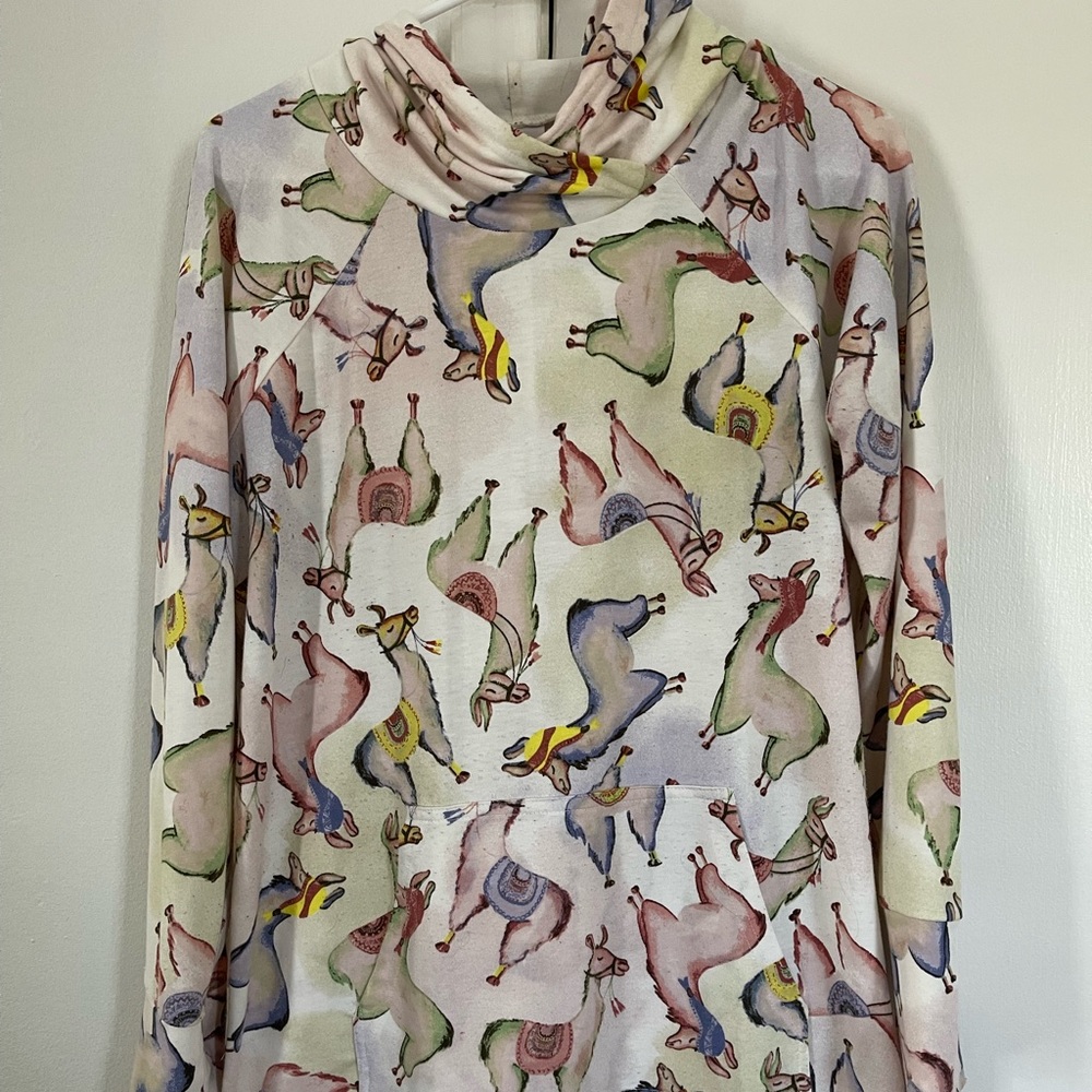 Llamas pull over hoodie with front pocket.